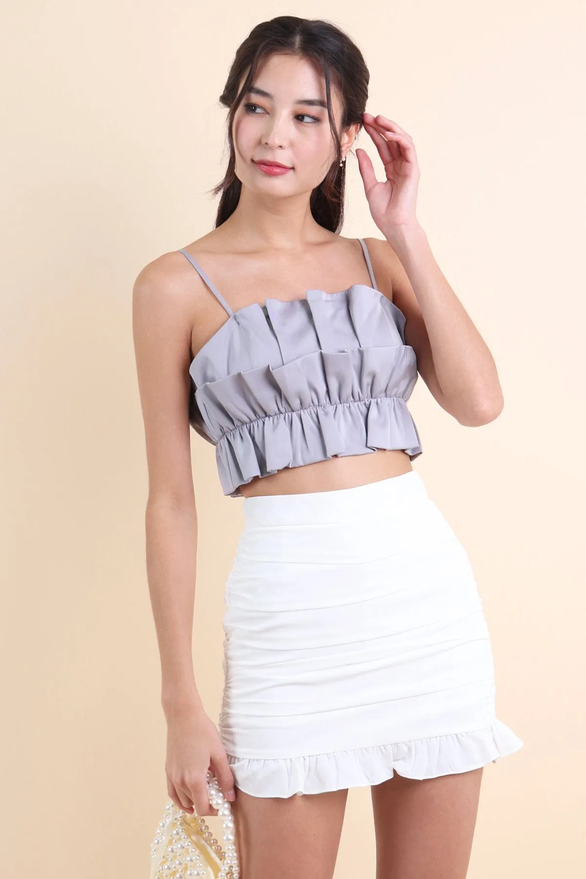 GENESIS RUFFLES TOP IN PERIWINKLE GREY